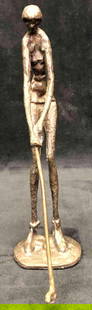 Brass Lady Golfer Sculpture: This lot contains a brass lady golfer sculpture. The brass has a patina appearance.This is a very old sculpture. This is the perfect gift for any woman golfer. The sculpture is approx 4 1/2" x 2 1/2"