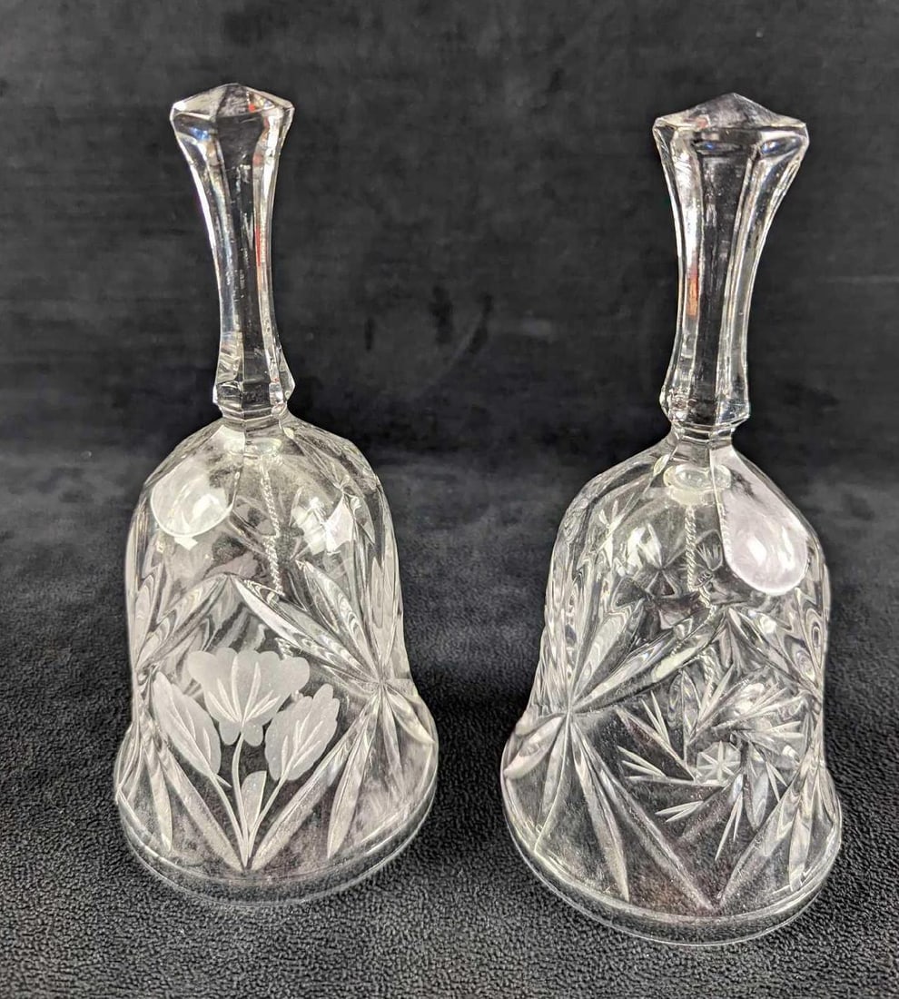 2 Vintage Pressed Glass Bells: This lot includes: (1) Glass Bell With Frosted Floral Design. Is approx 3 1/8" x 3 1/8" x 6 3/4" and it weighs 0.68lb. (1) Glass Bell With Swirl Design. Is approx 3 1/8" x 3 1/8" x