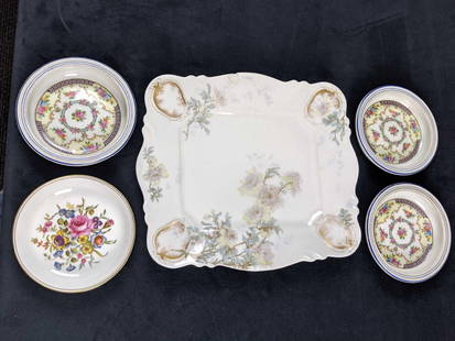 Antique Ceramic Serving Tray And Saucers: Set of four saucers and one small serving tray features a beautiful floral pattern. Three are Bavarian Porcelain made in Schuman, Germany and measure 5&#39;. The other is Royal Worcester and made in E