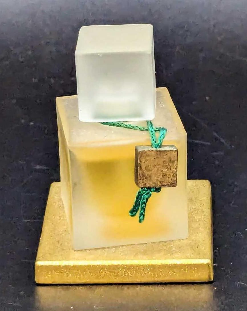 Realites Pure Perfume 75 ml By Liz Claiborne: Realites Pure Perfume 75 ml By Liz Claiborne. This is approx 1 5/8" x 1 5/8" x 2 1/4" and it weighs 0.22lb. The bottle is nearly filled to the top. The bottle has no chips or cracks