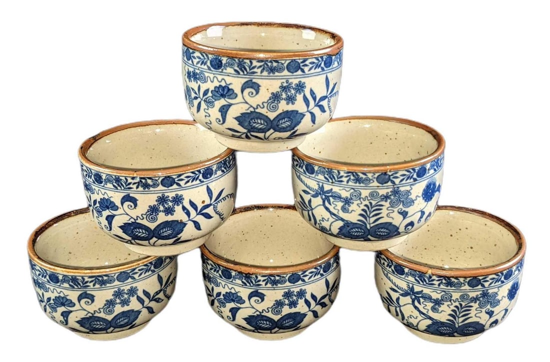 Six Chinese Ceramic Floral Design Tea Cups: Six Chinese Ceramic Floral Design Tea Cups. The maker and date of creation are unknown. Is approx 3" x 3" x 2" and together they weigh 2.24lb. The teacups are in a good, vintage condition with n