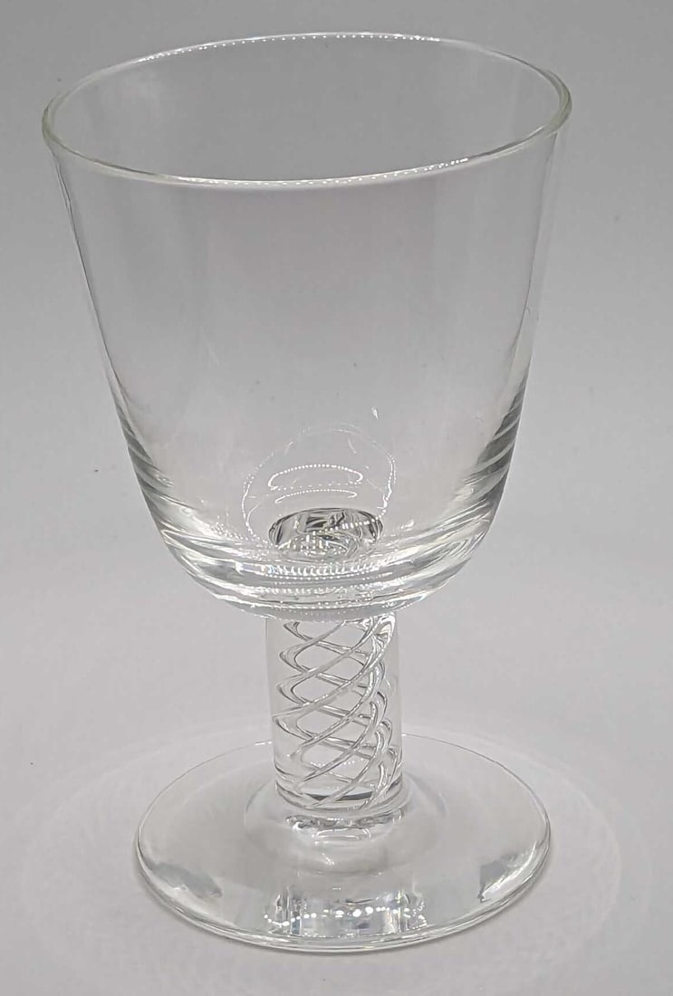 Steuben Crystal Water Goblet With Air Twist Stem E: Steuben Crystal Water Goblet With Air Twist Stem E. This is approx 3 1/4" x 3 1/4" x 5 1/4" and it weighs 0.70lb. It comes with a Steuben-branded storage bag. The bottom center of the base is marked S