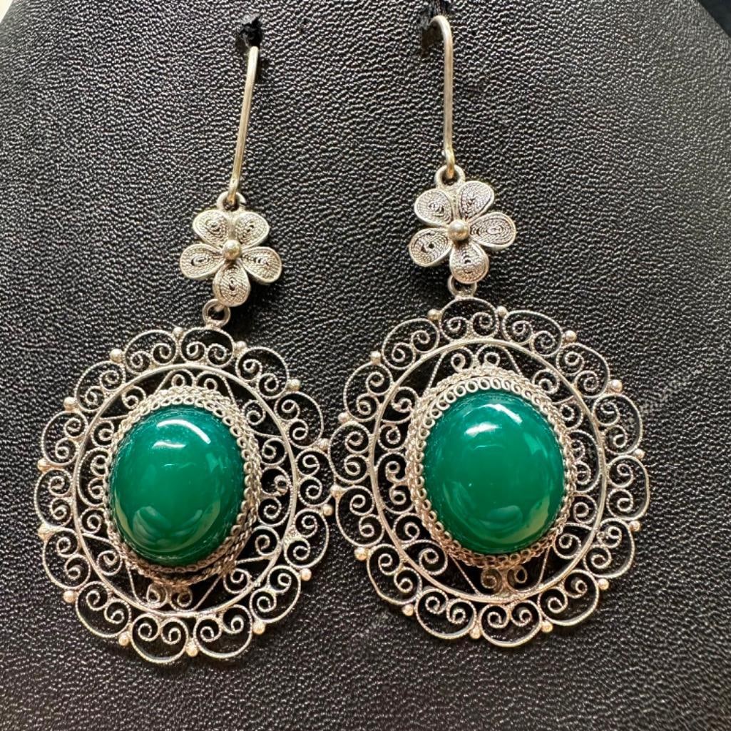 .800 Silver Ornate Green Cabochon Earrings: This piece of jewelry has been tested and researched prior to listing. Please view all our pictures they are part of our description. DETAILS: Metal - .800 Silver Color - Silver Stones - u/k Hallmarks