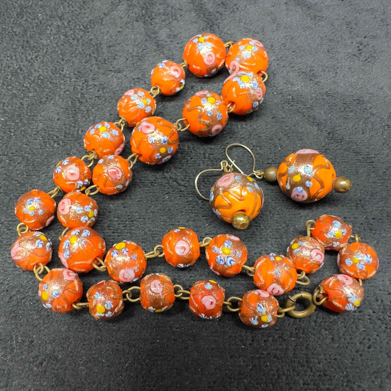 Venetian Murano Lamp Work Art Glass Orange Round Fiorato Bead Necklace and Floral Earrings Set B73: Venetian Murano Lamp Work Art Glass Orange Round Fiorato Bead Necklace and Floral Earrings Set B73. Necklace and earrings with orange colored glass beads with beautiful hand painted designs on each. T