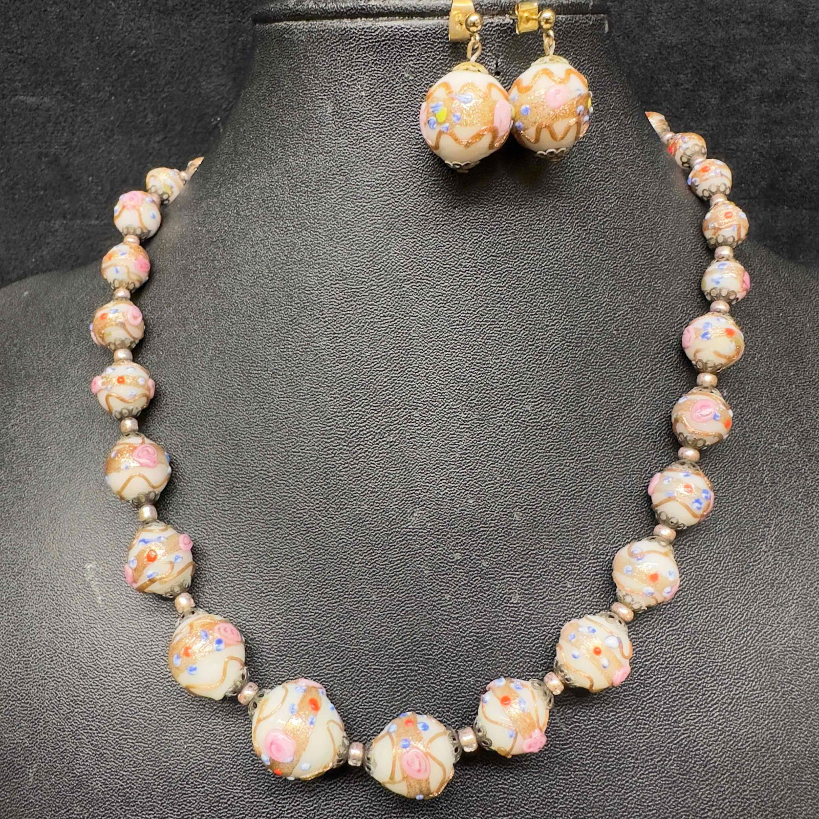 Venetian Murano Lamp Work Art Glass Floral White Bead Necklace and Fiorato Earrings Set B75: Venetian Murano Lamp Work Art Glass Floral White Bead Necklace and Fiorato Earrings Set B75. Necklace and earrings with white colored glass beads with beautiful hand painted designs on each. The neckl