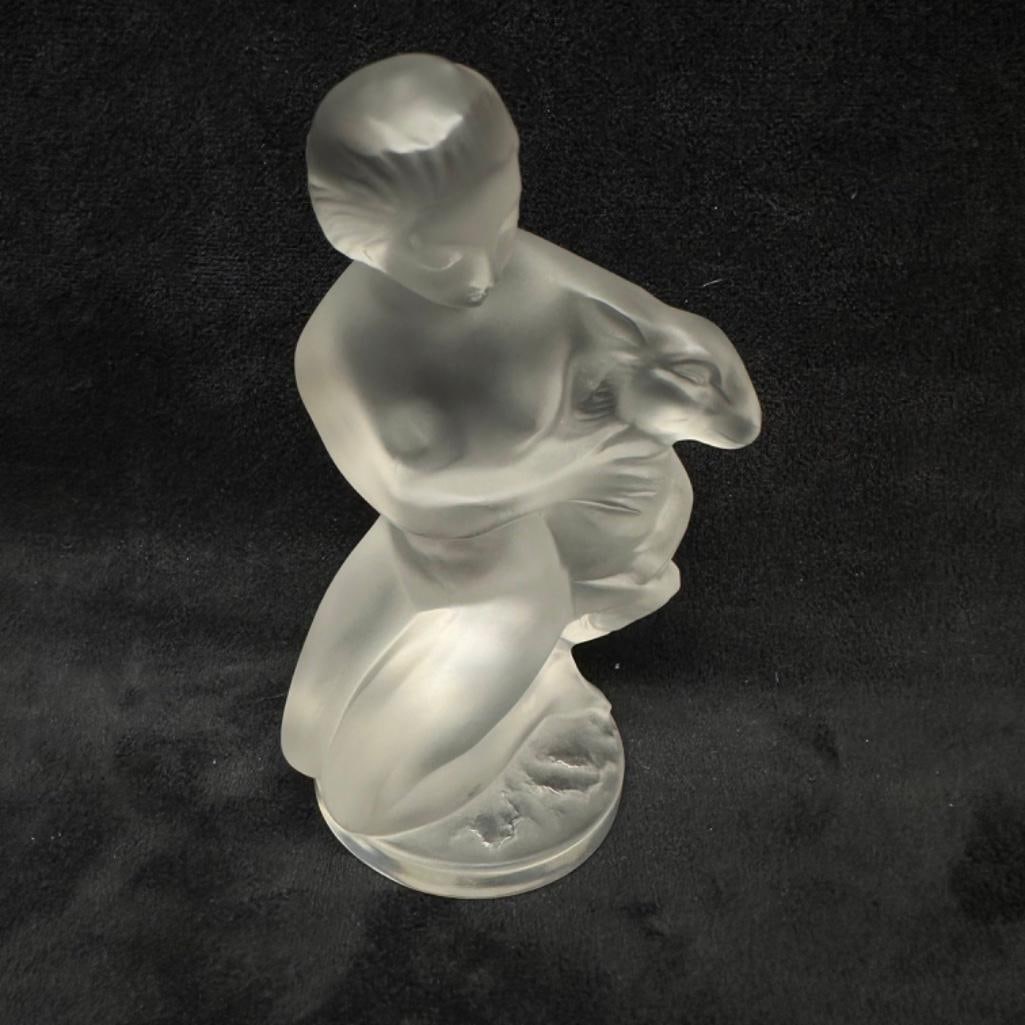 Lalique Diana Crystal Figure: Lalique Diana Crystal Figure Diana and fawn figure by Lalique, in clear crystal with their signature frosted texture. The figure stands 4.5" tall and weighs approximately 0.75 lbs. In good conditi
