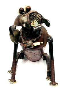 Steel/IronFolk Art Dog Sculpture: This lot contains a Steel/IronFolk Art Dog Sculpture. It is approx 17" x 9" x 14 1/2" and it weighs about 16lbs. Overall the Dog sculpture is in good used condition with some light wear from use over