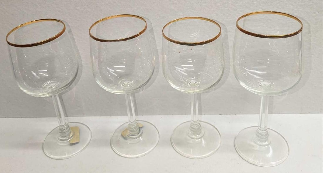 4 German Crystal Clear Industries Wine Glasses: 4 German Crystal Clear Industries Wine Glasses. Each is approx 3 1/2" x 3 1/2" x7 5/8" and the total weight is 1.66lb. The wine glasses do not have any chips or cracks. Only two glasses have company t