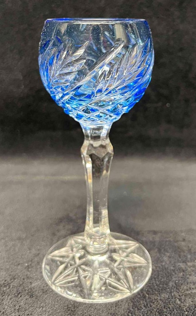 Light Blue Cut Glass Liquor Glass: This lot contains a Light Blue Cut Glass Liquor Glass. It is approx 2 1/4" x 2 1/4" x 4 3/4" and it weighs about 3.5oz. Overall the Cut Glass wine or liquor glass is in good used condition with no not