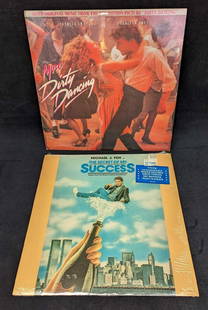 2 The Secret Of My Success & More Dirty Dancing LPs: 2 The Secret Of My Success &amp; More Dirty Dancing LPs. This lot includes:  (1) Various – The Secret Of My Success (Music From The Motion Picture Soundtrack). This was released by MCA Records in 19
