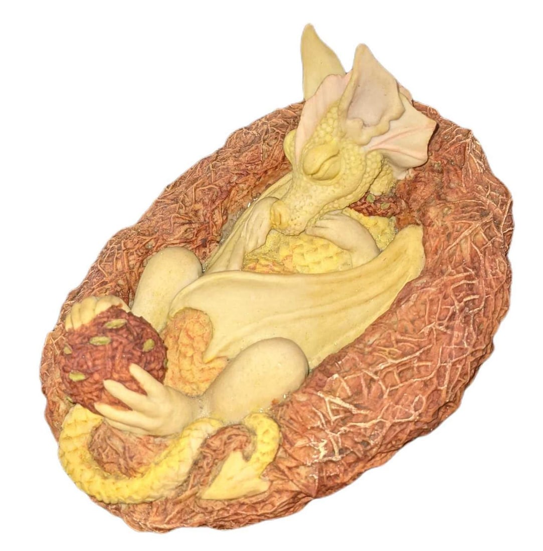 Enchantica Rattajack Terragon Dreams Dragon Fantasy Figurine: Retired Enchantica "Rattajack Terragon Dreams" Fantasy Figurine. From "Wrath of the Ice Sorcerer". Was designed by Andrew Bill. Was released from 1988 to 1993. Hand-Painted Resin that was made in Staf