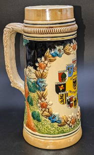 Vintage Germany Deutschland 9" Beer Stein: Vintage Germany Deutschland 9" Beer Stein. This is approx 5 1/2" x 4 1/4" x 9" and it weighs 2.49lbs. The ceramic stein has some signs of wear and some residue inside the stein.