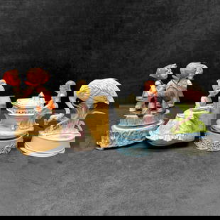 Vintage Musical Rotating Figurine Music Box Set Lot of Four: These items are in good pre-owned, previously displayed condition with light wear, and surface scratches. Please reference all photos for full details.  Kids: 7 1/4&#34; tall x 4 1/4&#34; diameter. Fl