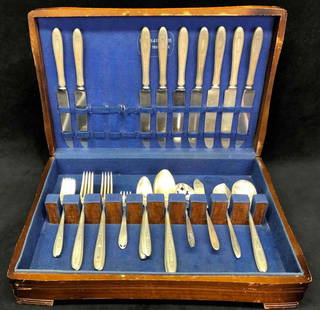 Inlaid Silver Plated Silverware Set Holmes & Edwards Silverware: This lot contains an inlaid silver plated silverware set by Holmes & Edwards. This set includes silver plated forks, knives and spoons. This is not a full set. There are 15 spoons, (3 soup, 6 dinner,