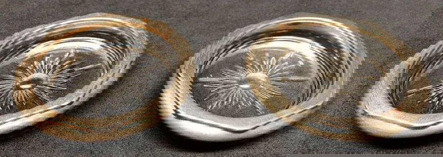 Pair Vintage MCM Clear Cut Glass Silver Plate Coasters: This lot contains Pair of Vintage MCM Clear Cut Glass Silver Plate Coasters. Each coaster is approx 4&#34; x 4&#34; x 3/4&#34; with a combined weight of about 0.5lbs. Overall the Vintage MCM Coasters