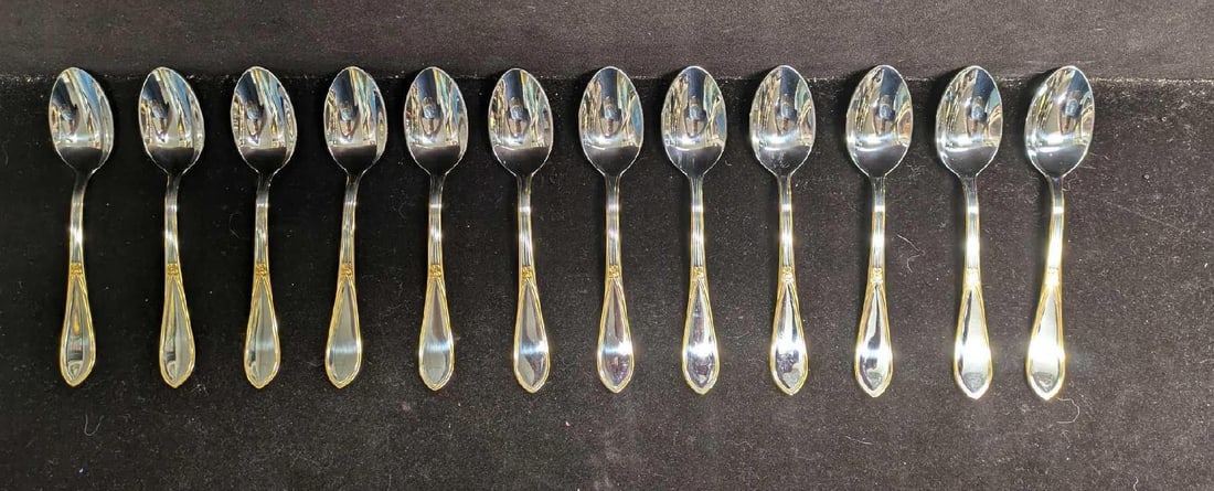 12 German 3Plus Solingen 18/10 Teaspoons: 12 German 3Plus Solingen 18/10 Teaspoons. Each is made of rust-resistant 18/10 chrome-nickel stainless steel. Each spoon is approx 1 1/8" x 3/8" x 5 3/4" and the total weight is 0.81lb. The spoons hav