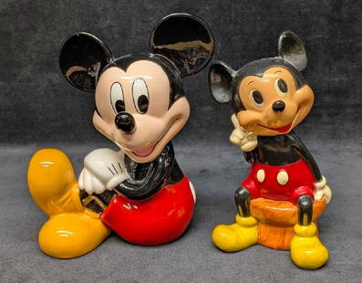 Vintage And Modern Ceramic Disney Mickey Mouse Piggy Banks: Vintage And Modern Ceramic Disney Mickey Mouse Piggy Banks. The lot includes:  (1) Vintage (Made In Korea) Ceramic Mickey Mouse Piggy Bank. This is approx 7 1/4&#34; x 4 1/4&#34; x 3 1/2&#34;. Has som