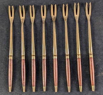 Set Of 8 Vintage Solid Bronze Carving Forks: Set Of Eight Vintage Solid Bronze Carving Forks. Each fork is approx 9 1/4" long. Comes with the original box which is approx 14" x 3 1/2" x 1 1/2" and it weighs under one pound at 0.93lb. Each fork i