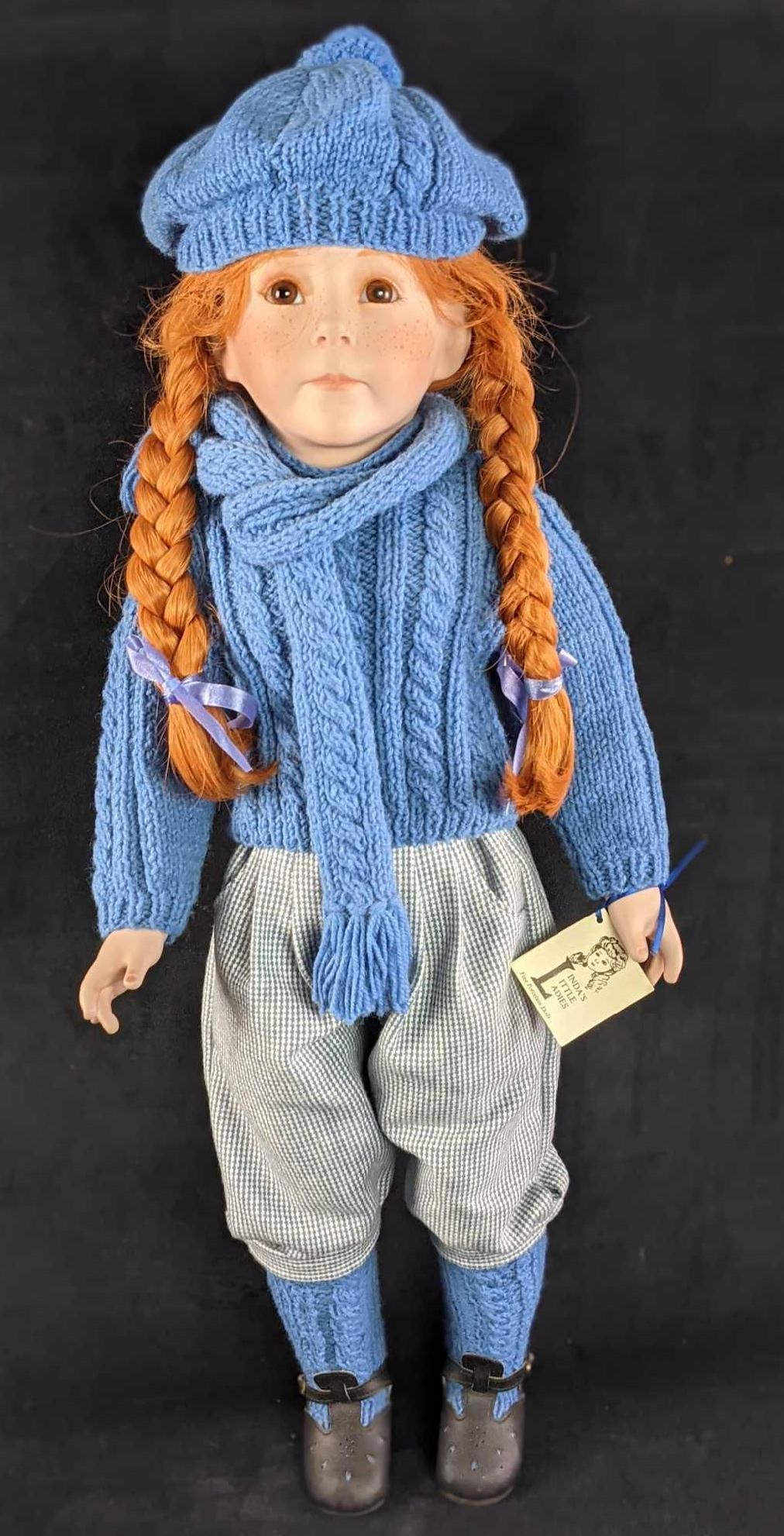 Linda's Little Ladies Porcelain Redhead Girl Doll: Linda's Little Ladies Porcelain Redhead Girl Doll. The doll is called "Willow" and was hand-made from German & French antique dolls. Has glass eyes and real human hair. Tag claimed doll is signed