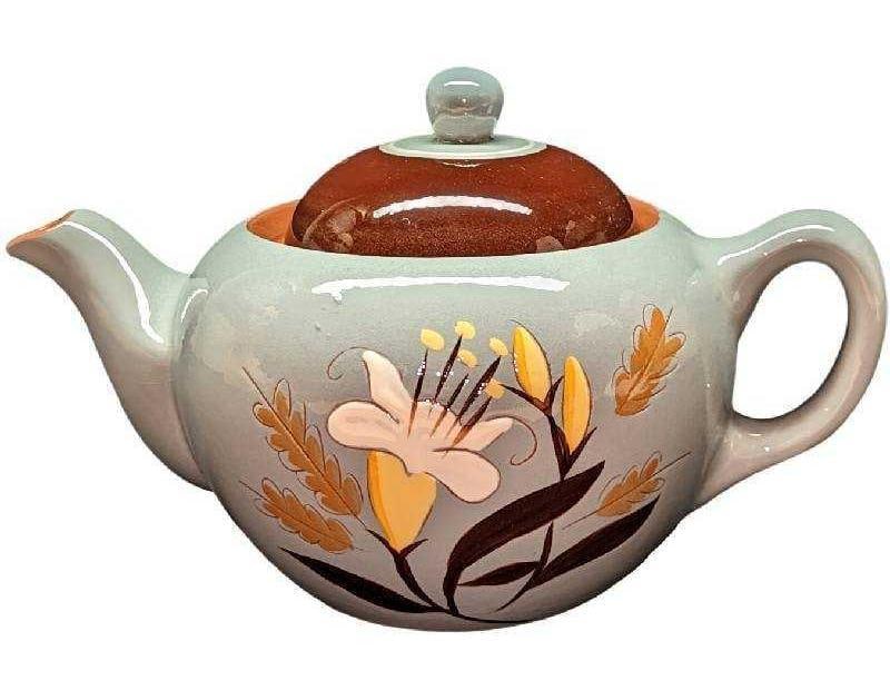 Retired Vintage Stangl Golden Harvest Pottery Teapot: Retired Vintage Stangl Golden Harvest Pottery Teapot. This series was released from 1953 - 1978 (When the company was closed). The teapot is approx 11" x 6" x 6" and it weighs 2.50 lbs. There is a ver
