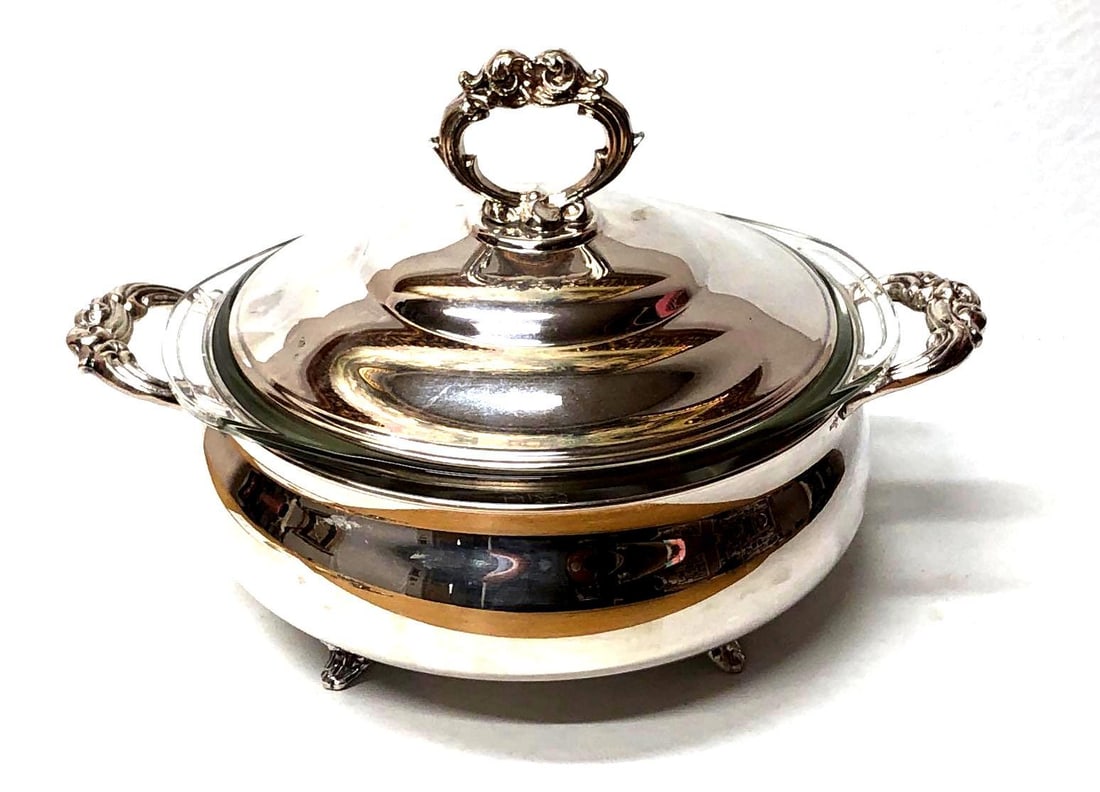 English Silver Mfg Co - Silver Plate Footed Tureen with Handles, Lid & Glass Pyrex Insert: English Silver Mfg Co - Silver Plate Footed Tureen with Handles, Lid and Glass Pyrex Insert. The item measures approximately 11-1/2" x 7-1/2" x 9" and weighs about 3.9lbs. The Silver Plate Dish i
