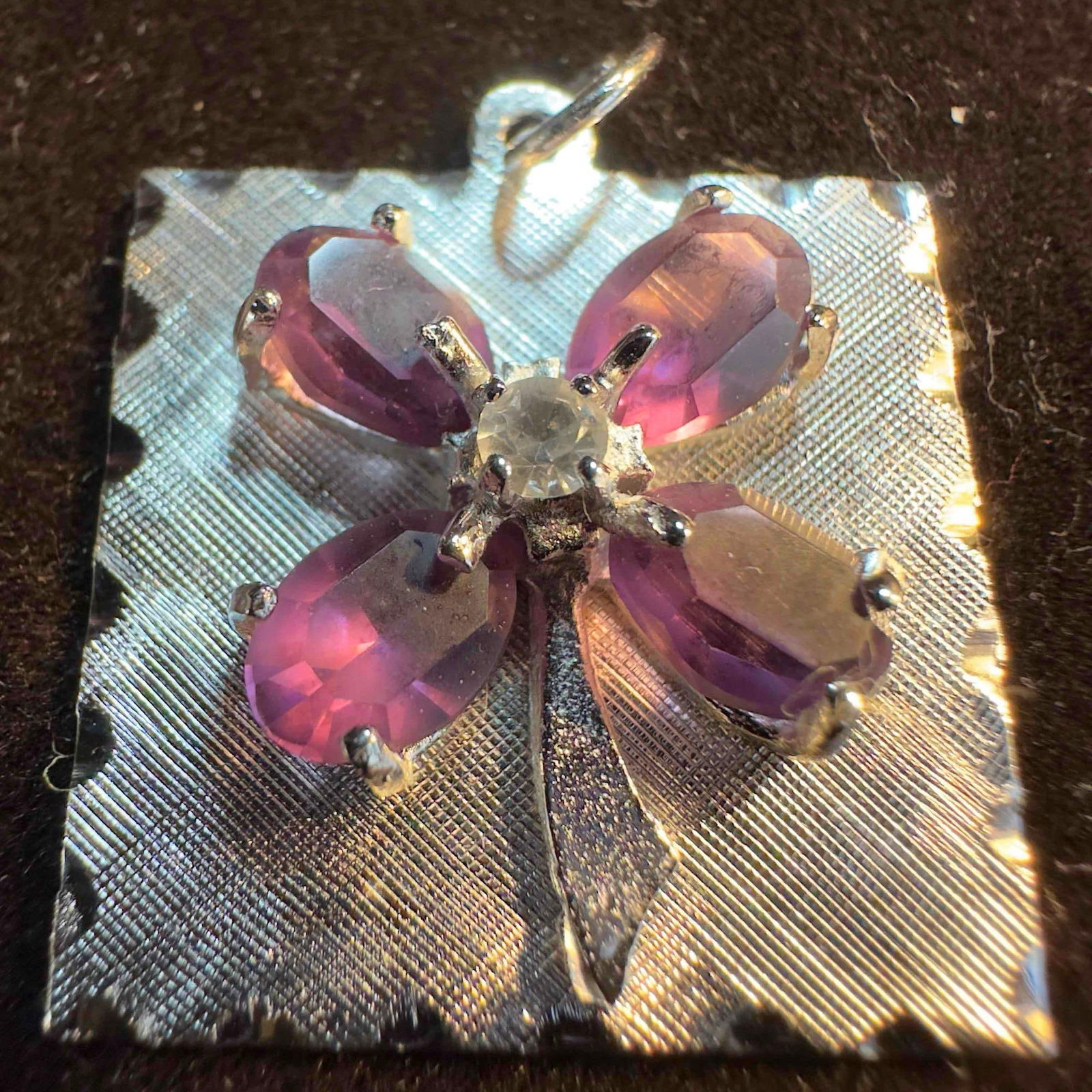 Amethyst Cubic Zirconia Floral Purple Stone Flower Sterling Silver Pendant: This item is in good pre-owned, previously used/displayed condition with noticeable light wear, and surface scratches. Please reference all photos for full details. This piece of jewelry has been test