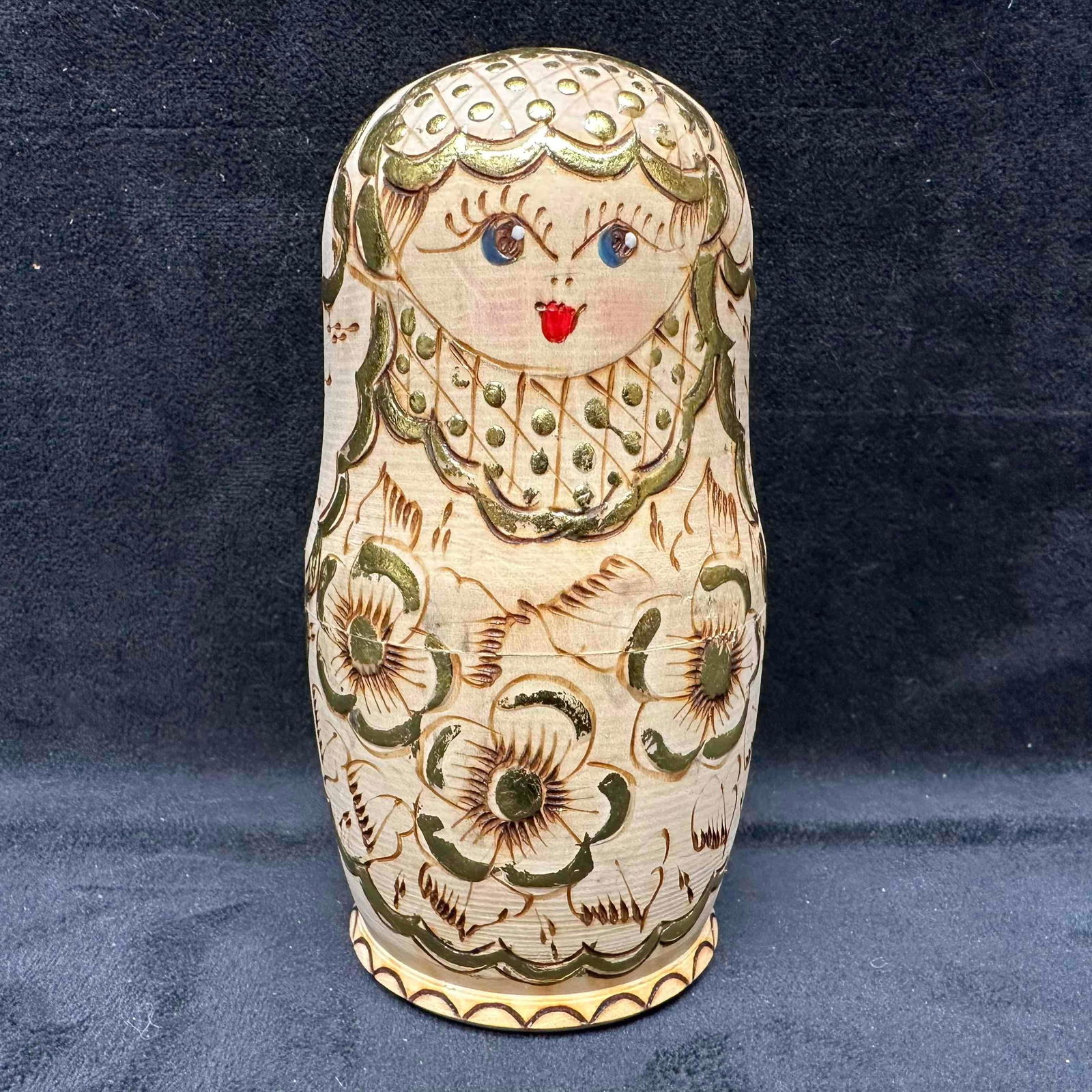 Hungarian Wood-Burned Matryoshka Nesting Dolls Set of Five Folk Art: Handcrafted set of 5 Hungarian matryoshka nesting dolls featuring wood-burned floral patterns highlighted with gold accents. Each doll is hand-painted with distinct facial details and traditional folk