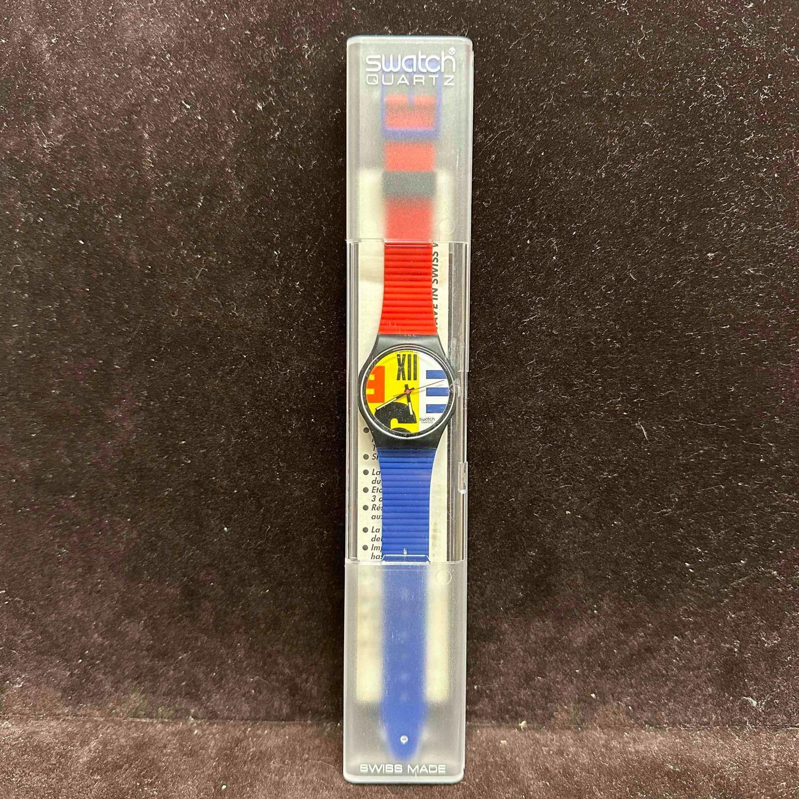 Swatch Nine to Six GB117 Quartz Watch 1987 Original Box: Vintage Swatch Gent model GB117 “Nine to Six,” released in 1987. Features a bold pop-art dial with oversized numerals 3, 6, 9, and Roman XII, framed in a colorful, historic Swatch aesthetic. C