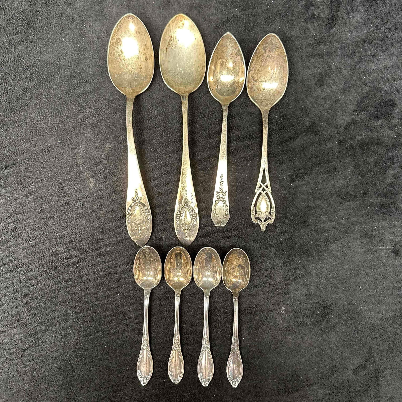 Sterling Silverware Spoon Set Eight Spoons 925: Each piece has a unique design along the handle, various patterns. Each piece has a hallmark and Sterling or 925 engraved marking on the back of the silverware. 8 eight piece silverware set. These ite