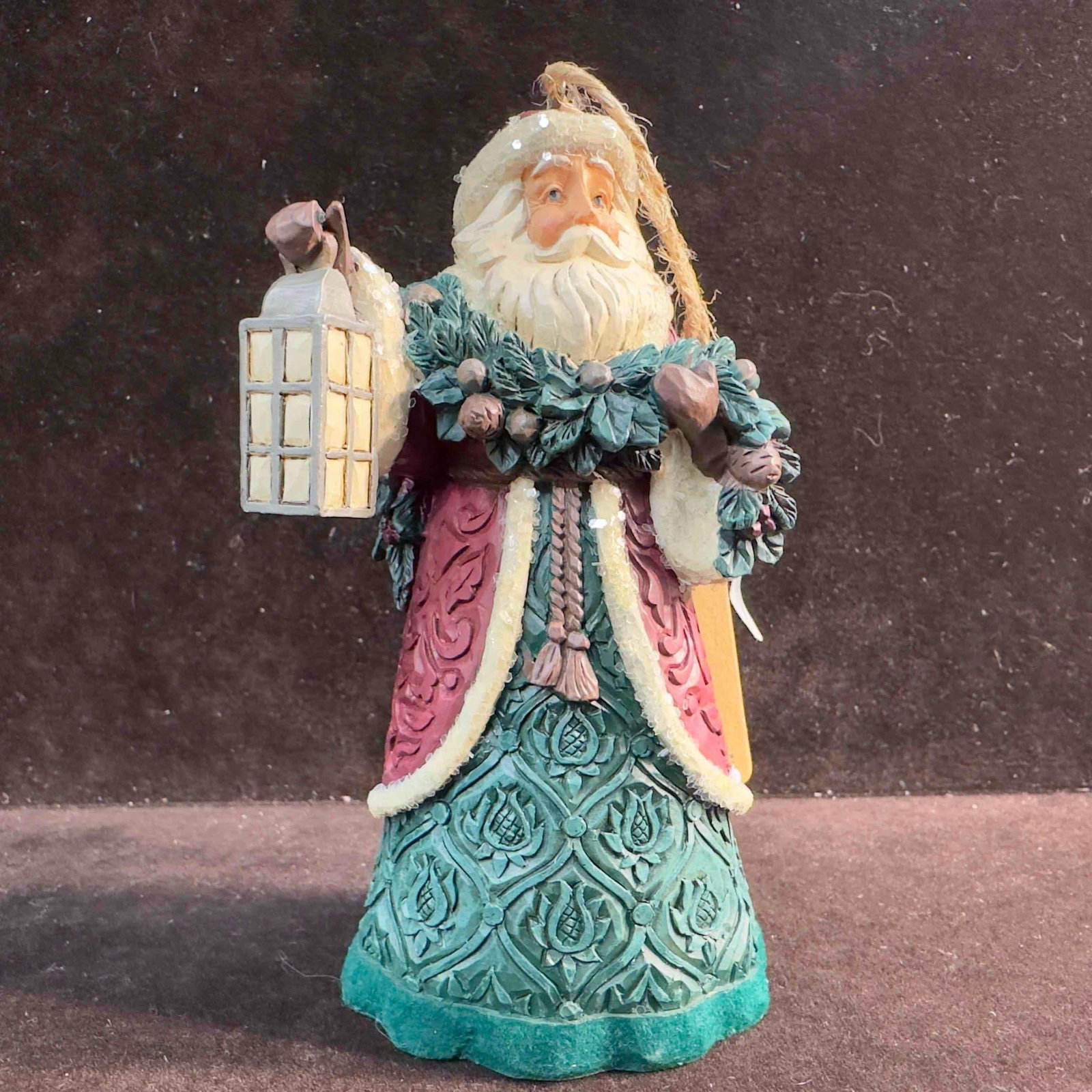 Jim Shore Heartwood Creek Enesco Victorian Santa Ornament: Jim Shore Heartwood Creek Enesco Victorian Santa Ornament. This beautiful Enesco Jim Shore Heartwood Creek hand painted ornament features a Victorian Santa with lantern and garland. 6006601 Victorian 