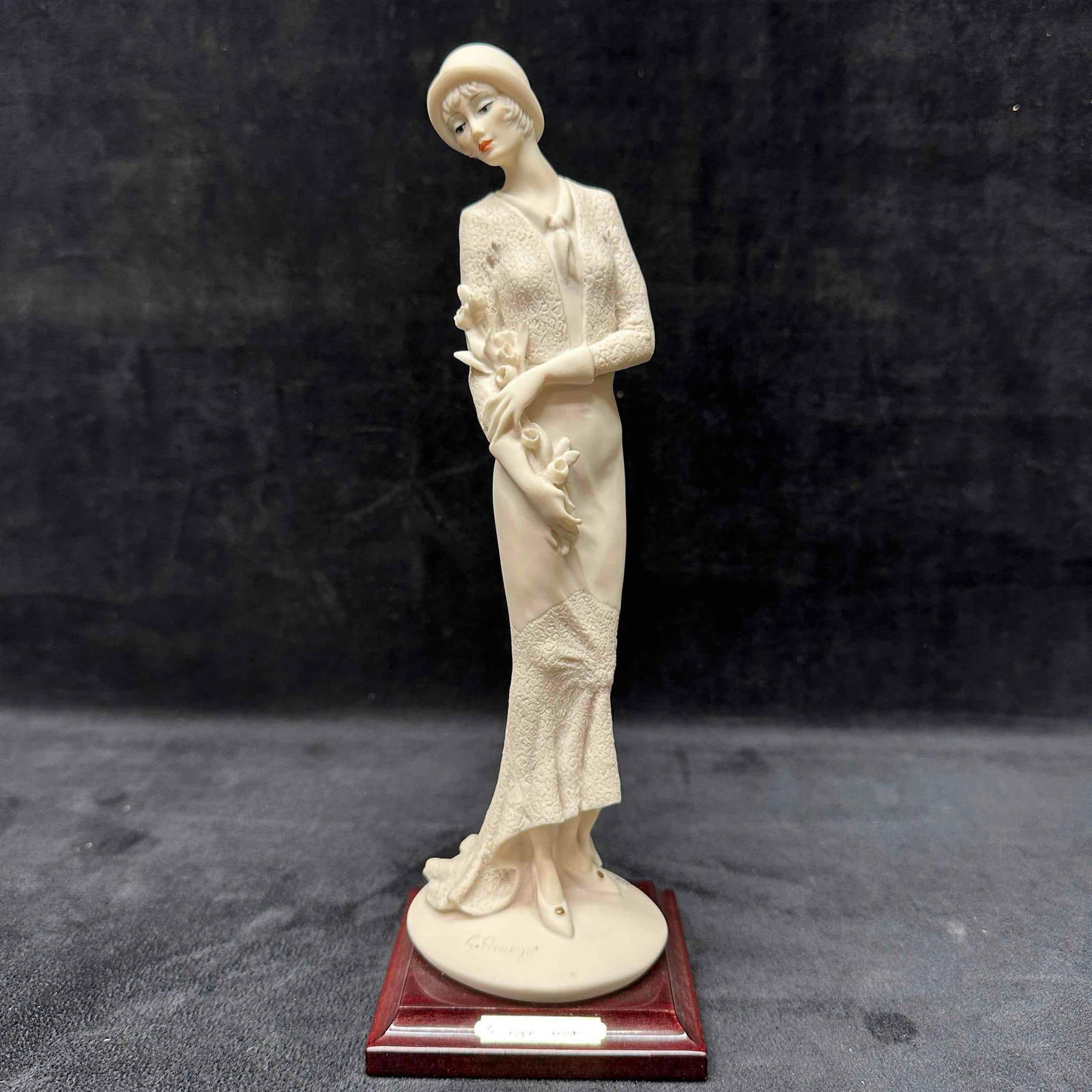 Florence Giuseppe Armani Figurine Lady with Flowers R154: Figure shows minor markings, black marks and staining. No noticeable chips, cracks, or breaks. This item is in pre-owned, previously displayed condition with normal light wear, and surface scratches.