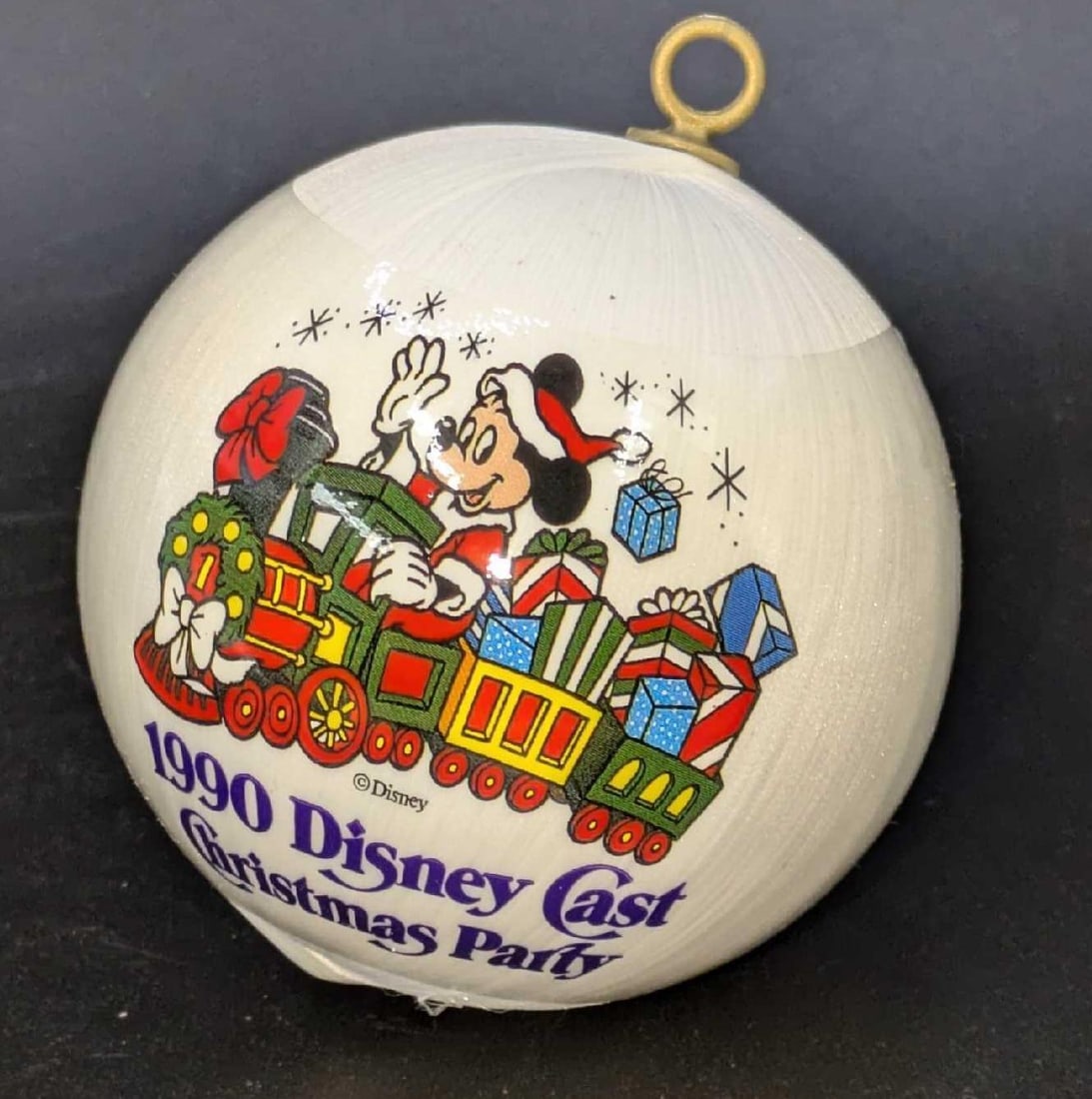 1990 Disney Cast Christmas Ornament Mickey Mouse: 1990 Disney Cast Christmas Ornament Mickey Mouse. This ornament comes in the original box that is approx 3 3/4" x 3 3/4" x 4 7/8" and it weighs 0.10lb. The ornament box has some light shelf wear and t