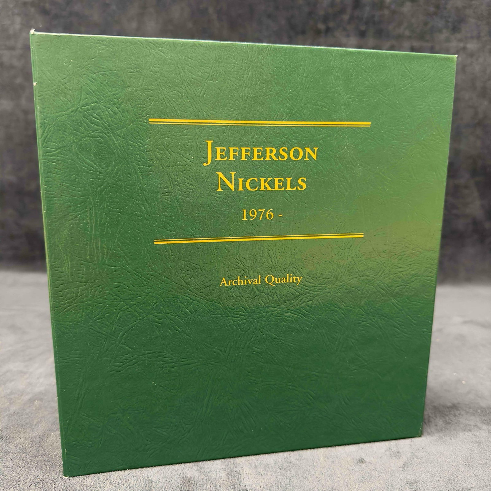 Jefferson Nickel Series Volume Two 1976-2006 Littleton Custom Coin Album 85 Coins: Jefferson Nickel Series Volume Two 1976-2006 Littleton Custom Coin Album. Custom coin album with Jefferson Nickel Series Volume Two 1976-2006. A total of 85 Nickels. These items are in good pre-owned,