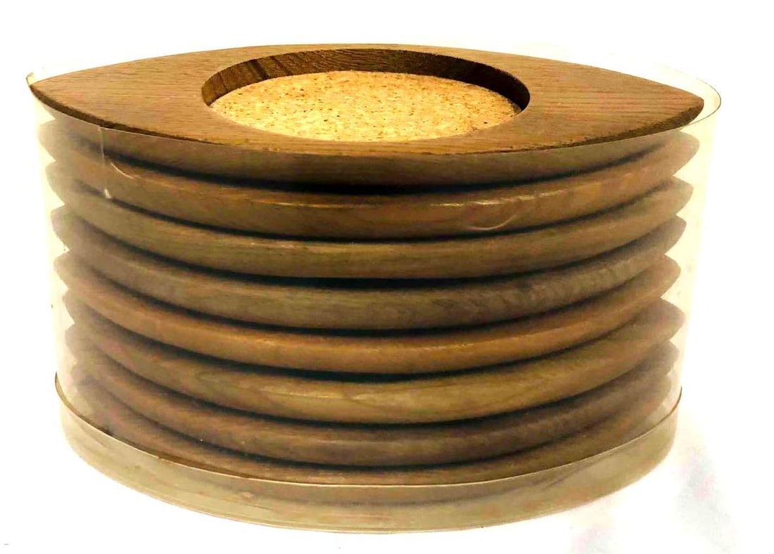 Hand Carved Hardwood Japan Coasters Set Of 8: This lot contains Hand Carved Hardwood Japan Coasters Set Of 8. Each coaster is approx 5 1/4" x 2 3/4" x 1/4" and altogether they weigh about 0.4lbs. Overall the coasters are in good used condition wi