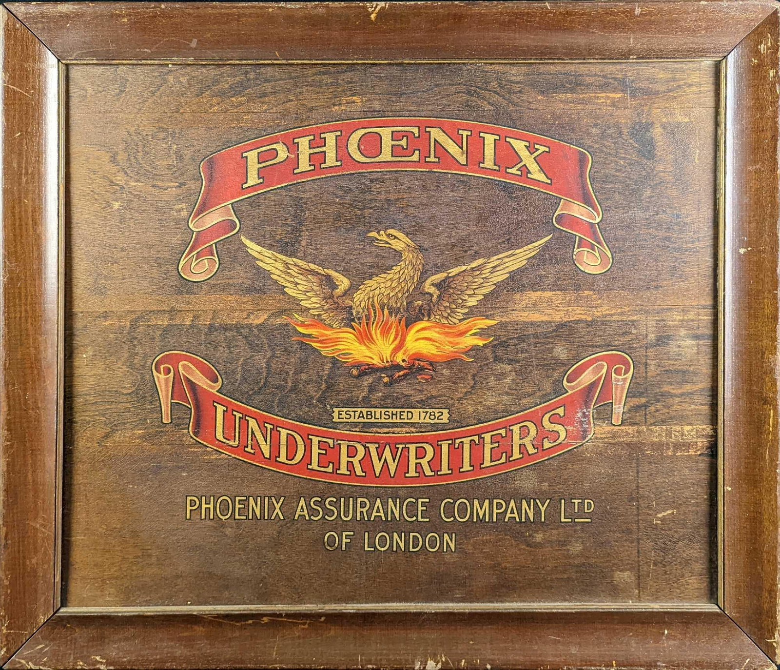 Vintage Rustic Wooden Phoenix Underwriters Sign: Vintage Wooden Phoenix Underwriters Sign. The sign is approx 26" x 3/4" x 22" and it weighs 4lbs. The sign is in good, vintage condition with scratches and cracks in the color. Please see the images a