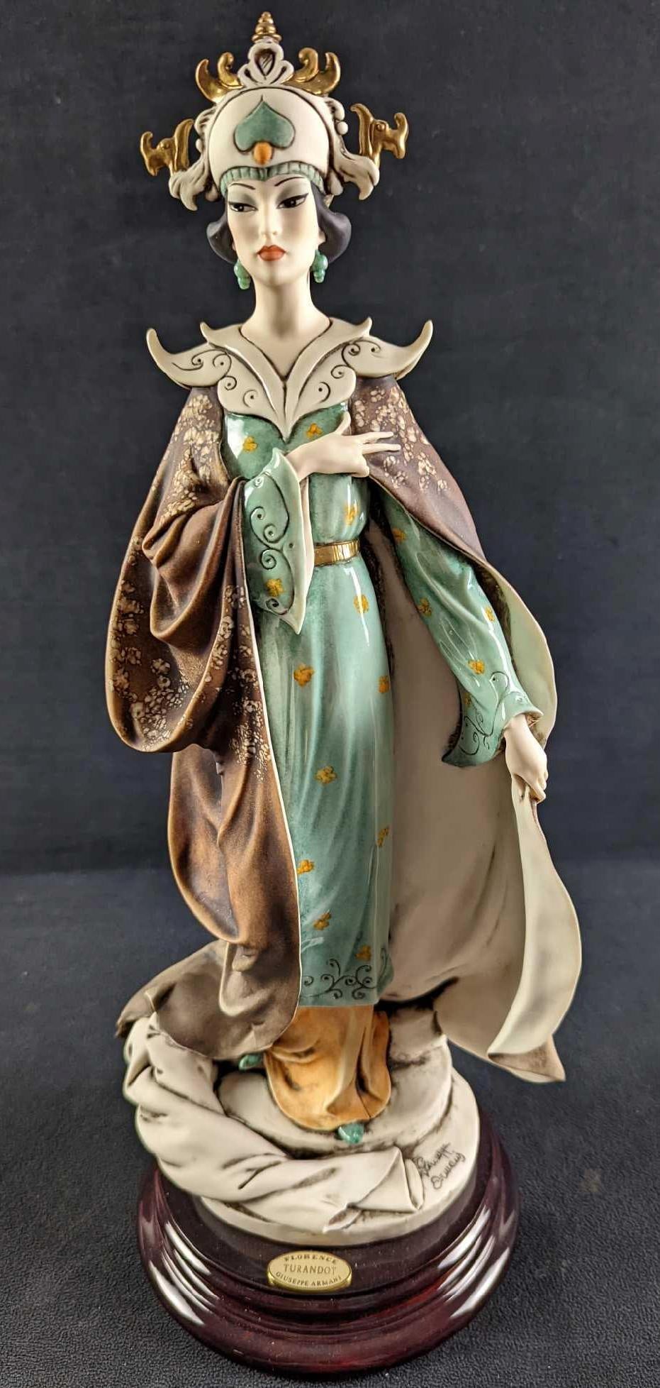 D18 Giuseppe Armani LE Turandot Figurine: Limited Edition "Turandot " Giuseppe Armani Figurine. This one is #76 out of #5,000. This comes in its original box along with the COA. The figurine is made of Capodimonte porcelain and is approx 7" x