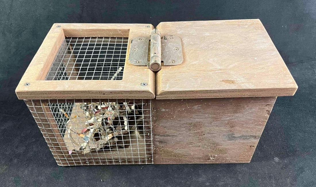 Squarrel Joke Trap Pratical Joke Animal Trap: This is is practical joke squirrel trap. This was handmade by a prop house to be used in local commercials. The "trap" is a faux tail that you can move through a hole on the bottom of the box,
