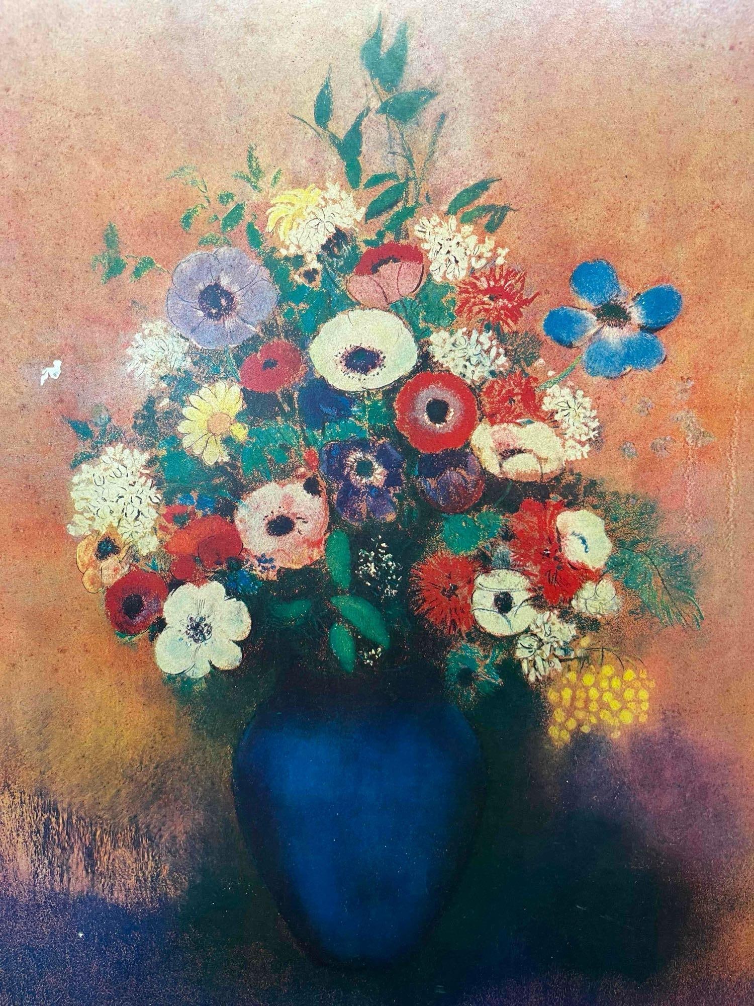 Framed Print On Wood Board Of Odilon Redon's Anemones and Lilac in a Blue Vase: This lot contains a Framed Print On Wood Board Of Odilon Redon's (April 20, 1840 - July 6, 1916) Anemones and Lilac in a Blue Vase. The original artwork is located at the Musee du Petit Palais, in