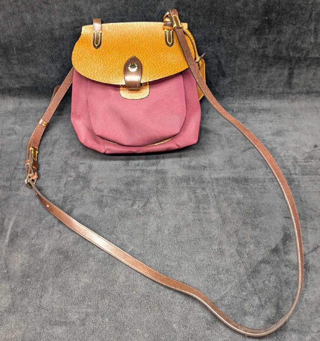 Dooney & Bourke Alto Happy Crossbody Saddle Bag: Dooney & Bourke Alto Happy Crossbody Saddle Bag. This is approx 8 1/2" x 2" x 8" and it weighs 0.69lb. 24" strap drop; adjustable Canvas & Leather Interior: On