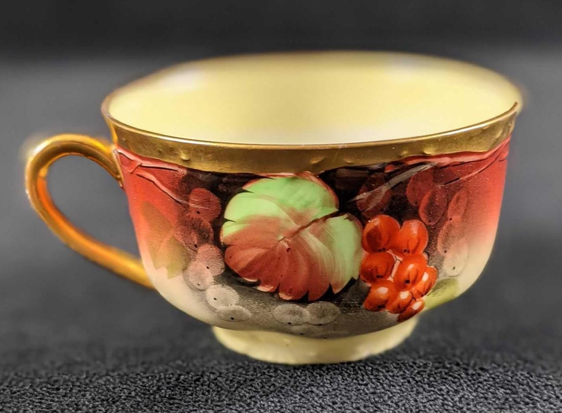 Vintage Bavarian Versalles Tea Cup Fruit: Vintage Bavarian Versailles Fine China Tea Cup With a grapevine design. Cup is approx 4" x 3 1/2" x 2". Cup is in good, vintage condition with two small chips.