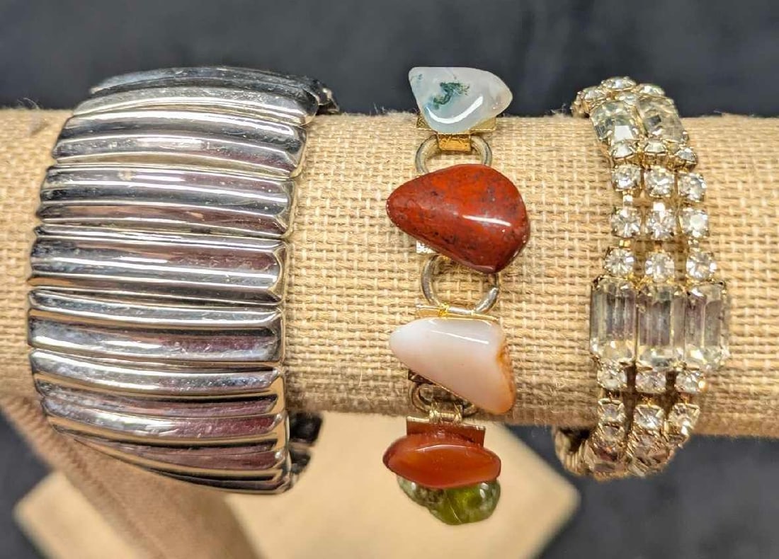 Vintage Trafai Expansion Polished Pebble Rhinestone Bracelets: Vintage Trafai Expansion Polished Pebble Rhinestone Bracelets . This lot includes: (1) Trifari Wide Silver Tone Expansion Bracelet. This is approx 1" x 2 3/4" x 2 3/4". Has some signs of