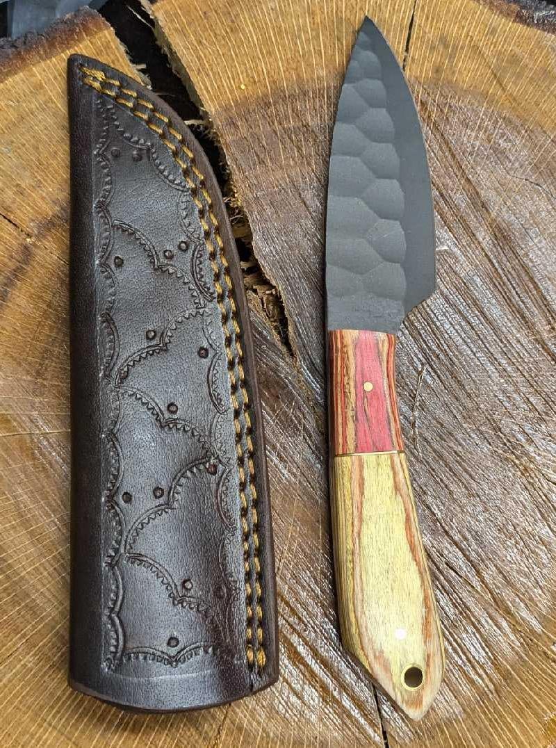 MHS Cutlery Carbon Steel Knife & Leather Sheath RTCT: MHS Cutlery Carbon Steel Knife & Leather Sheath RTCQ. Steel knife comes in a leather sheath. Is approx 2 1/4" x 3/4" x 8 3/4" and it weighs 0.39lb. The knife does not appear to have been used. The han