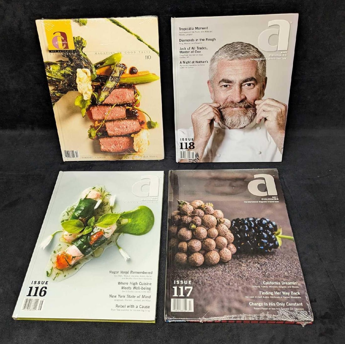 Art Culinaire Hardcover Magazines 110 116-118: Art Culinaire Hardcover Magazines 110 116-118. This lot includes four hardcover magazines. All are sealed except for #118. Each is approx 9 3/4" x 1/4" x 12 7/8" and the total weight is 5.70lbs. There