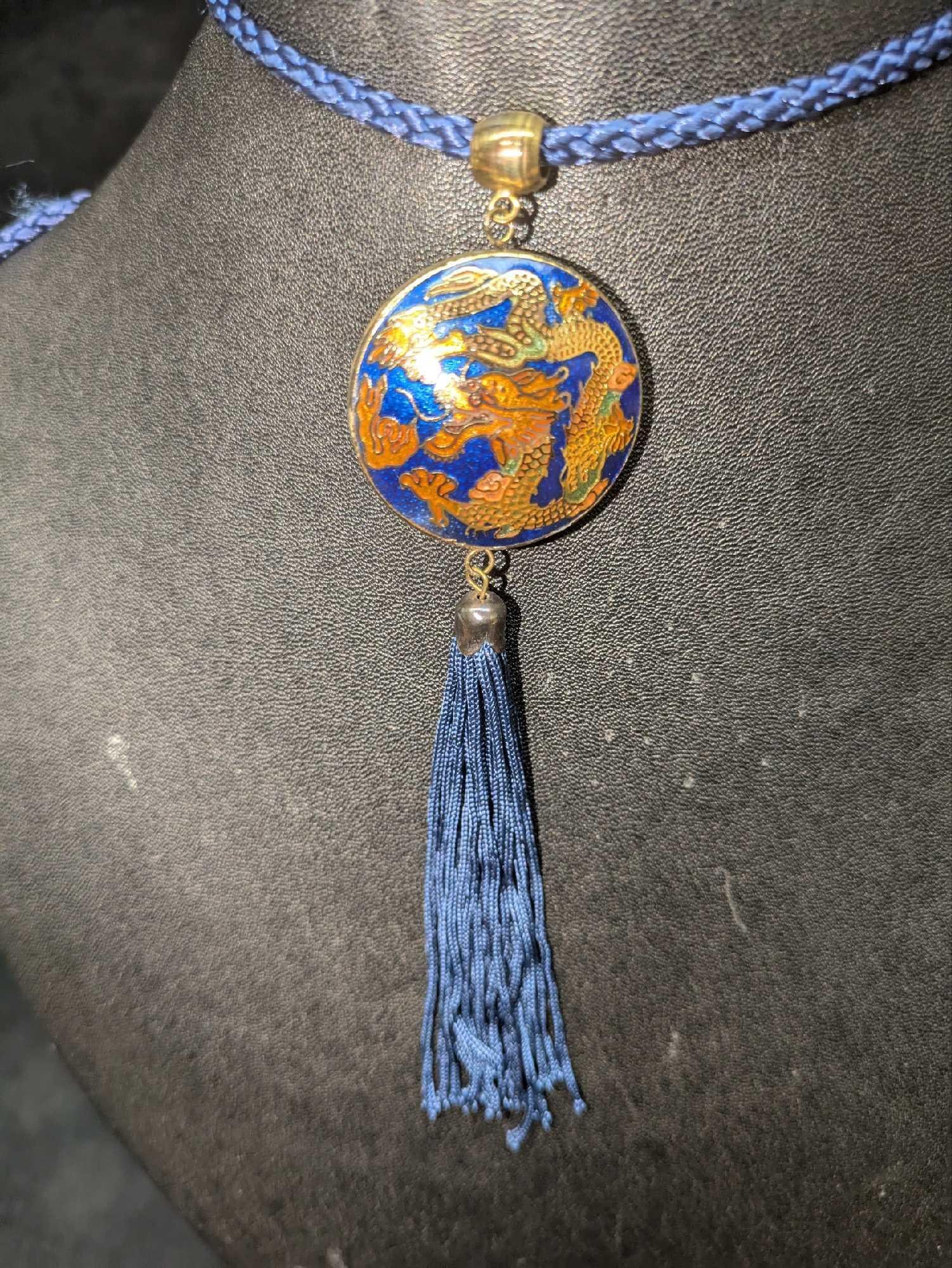 Vintage Tassel Necklace With Cloisonne Gold Tone Chinese Dragon: Vintage Tassel Necklace With Cloisonne Gold Tone Chinese Dragon. This is approx 31" and the pendant is approx 1 1/2" x 1/8" x 1 1/2". The total weight is 0.06lb. The assembly is made of brass 
