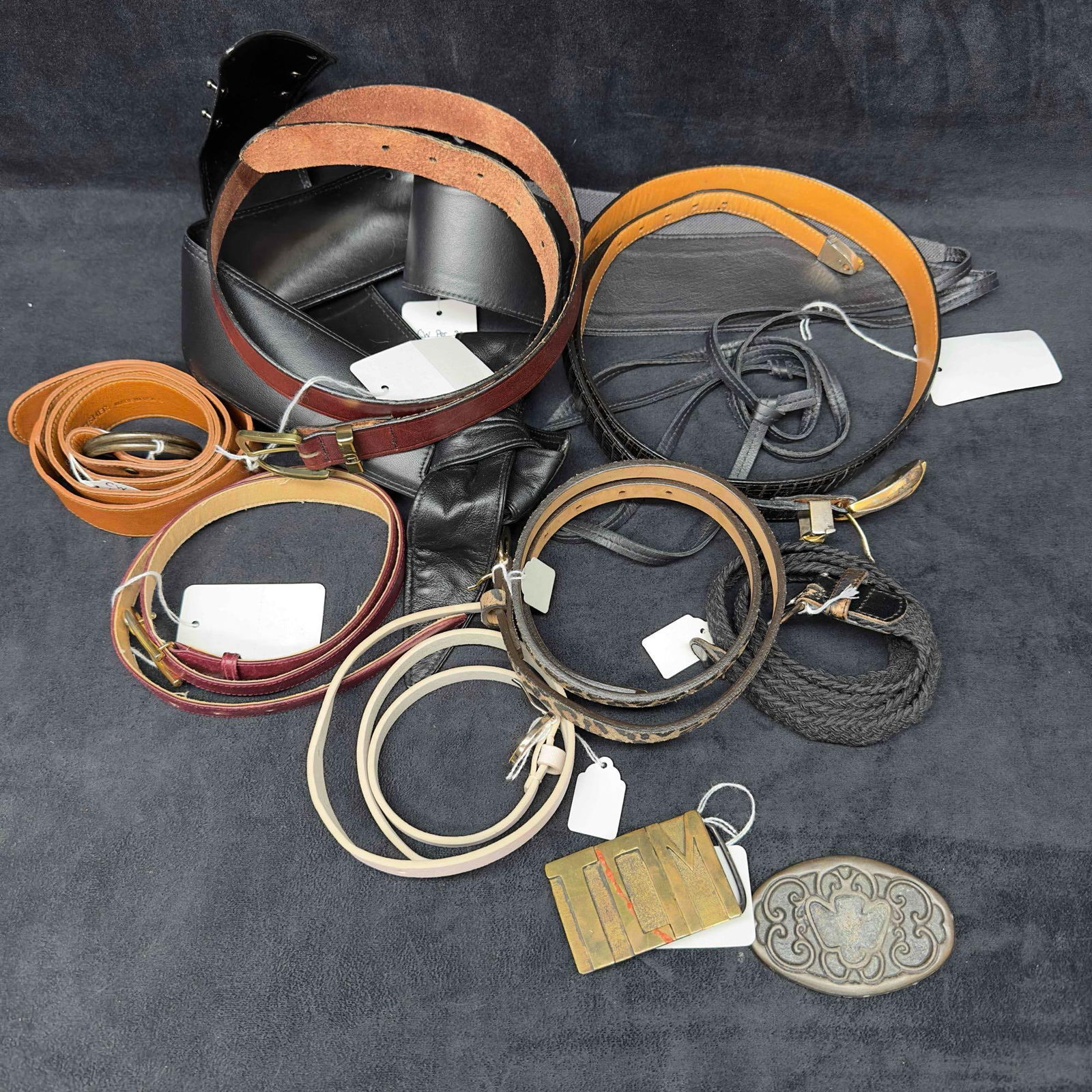 Leather Belt and Buckle Collection Lot of 11 Belts Buckles: Leather Belt and Buckle Collection Lot of 11 Belts Buckles. Various lot of belts and buckles made of leather and brass. This collection of belts and buckles include various styles and colors. Some vin