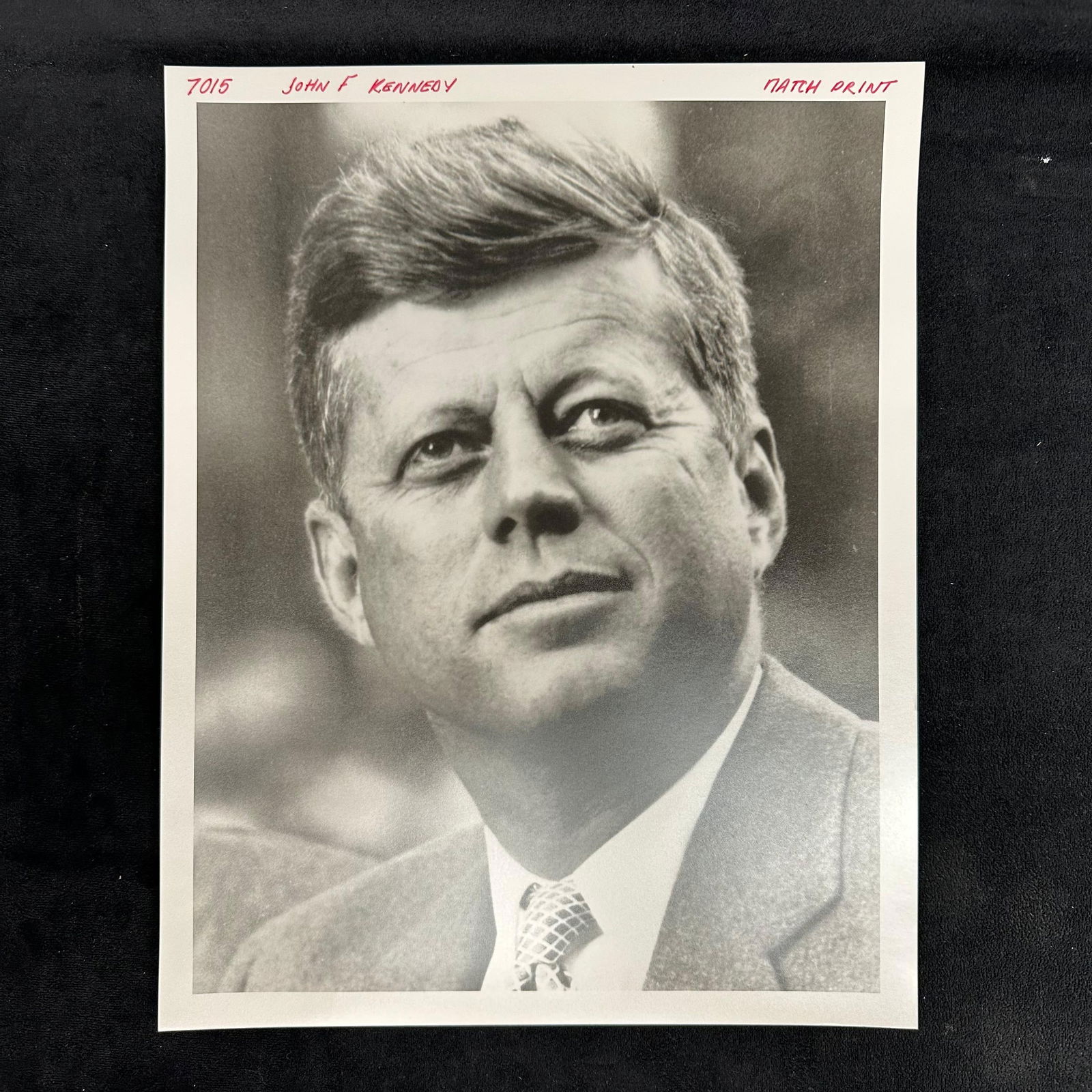 John F. Kennedy Black and White Portrait Analog Photograph Print: Black and white portrait photograph of President John F. Kennedy, printed on resin-coated pearl finish photo paper. This analog darkroom print captures JFK in a close-up pose with his characteristic e