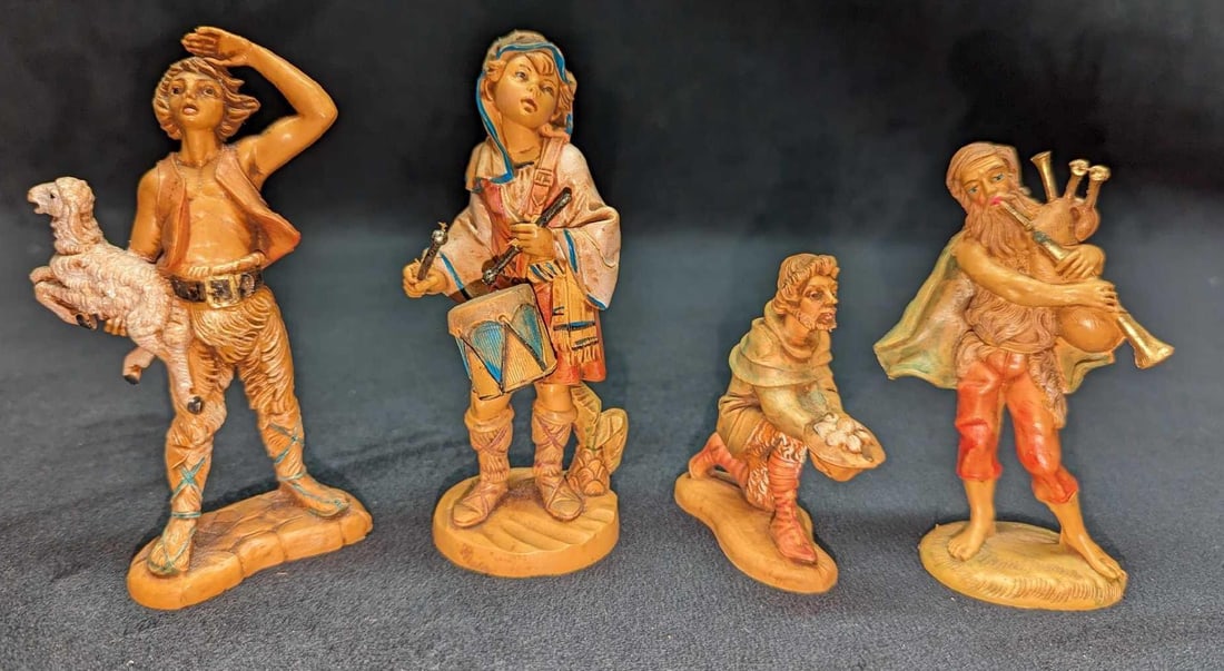 4 Vintage Italian Fontanini Nativity Figurines: 4 Vintage Italian Fontanini Nativity Figurines. This lot contains: (1) Drummer Boy Jareth Fontanini Nativity Figurine. Made of a Polymer. This is approx 2" x 1 7/8" x 4 3/4".Was released i