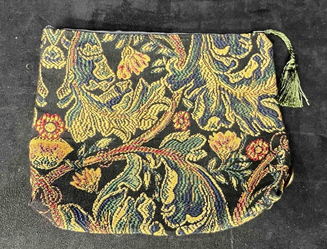 Belgian Tapestry Clutch William Morse Golden Lily Pattern: This lot contains a Belgian Tapestry Clutch William Morse Golden Lily Pattern. It is approx. 8 1/4" x 10". Total weight is approx 2.4oz. Overall the clutch is in good pre owned condition with min