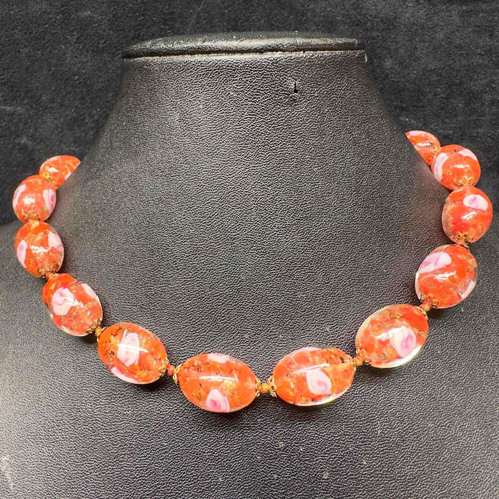 Murano Venetian Art Glass Lamp Work Red Floral Copper Beaded Necklace C69: Murano Venetian Art Glass Lamp Work Red Floral Copper Beaded Necklace C69. Necklace with red colored glass beads with beautiful designs on each. The necklace features floral and copper colored accents