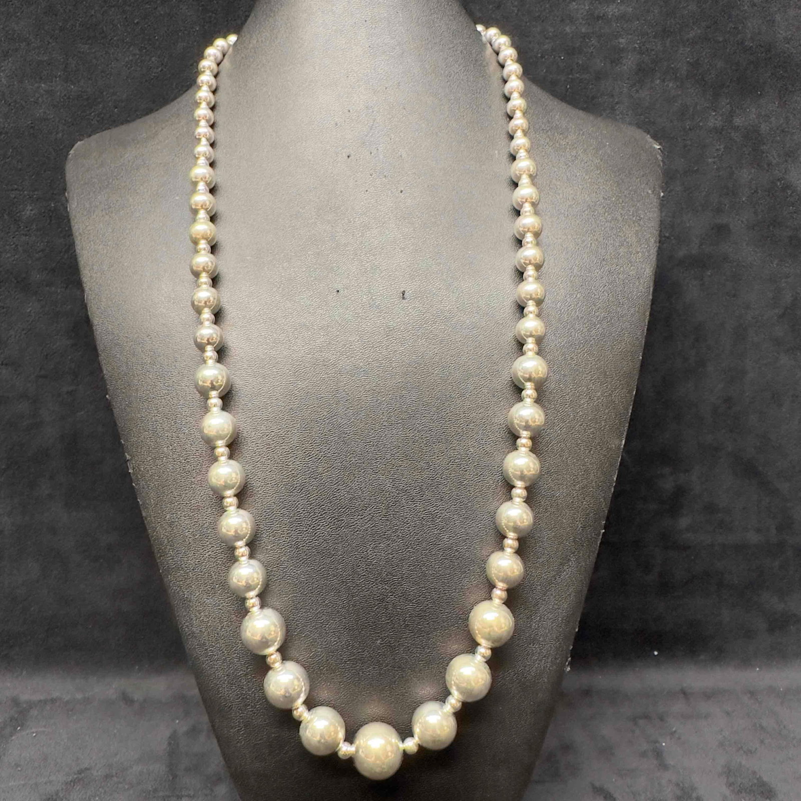 Sterling Silver Graduated Bead Necklace C73: This item is in good pre-owned, previously used/displayed condition with noticeable light wear, and surface scratches. Please reference all photos for full details. This piece of jewelry has been test